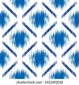 Ikat seamless pattern. Abstract background texture.