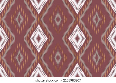 Ikat seamless pattern background Traditional pattern. Ikat seamless pattern tribal Aztec African motif on the carpet. Aztec style. Indian rug. Gypsy, Mexican embroidery. Ikat vector Print  for saree