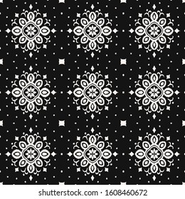 Ikat seamless pattern. Border with snowflakes. Openwork lace. New year Christmas background. Vector tie dye shibori print with stripes and chevron. Ink textured japanese background. Bohemian fashion. 