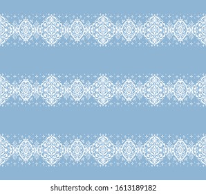 Ikat seamless pattern. Border with snowflakes. Openwork lace. New year Christmas background. Vector tie dye shibori print with stripes and chevron. Ink textured japanese background. Bohemian fashion. 