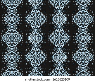 Ikat seamless pattern. Border with snowflakes. Openwork lace. New year Christmas background. Vector tie dye shibori print with stripes and chevron. Ink textured japanese background. Bohemian fashion. 