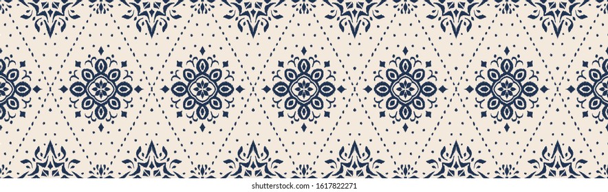Ikat seamless pattern. Border with snowflakes. Openwork lace. New year Christmas background. Vector tie dye shibori print with stripes and chevron. Ink textured japanese background. Bohemian fashion. 