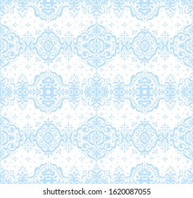 Ikat seamless pattern. Border with snowflakes. Openwork lace. New year Christmas background. Vector tie dye shibori print with stripes and chevron. Ink textured japanese background. Bohemian fashion. 