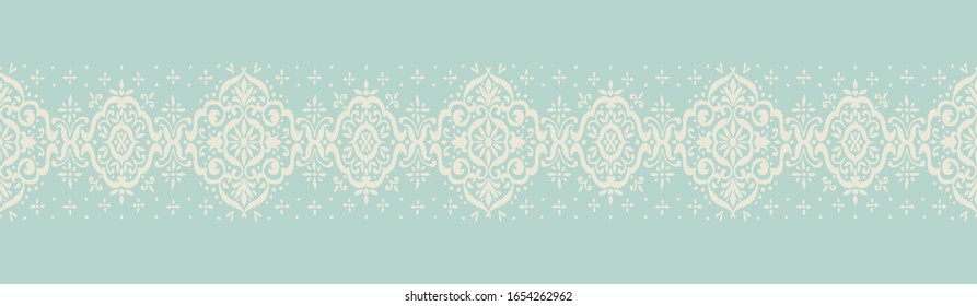 Ikat seamless pattern. Border with snowflakes. Openwork lace. New year Christmas background. Vector tie dye shibori print with stripes and chevron. Ink textured japanese background. Bohemian fashion. 