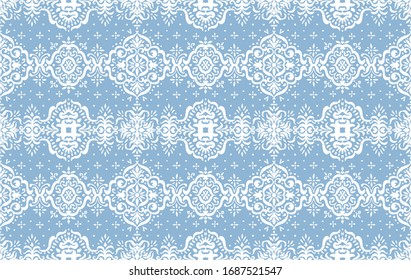 Ikat seamless pattern. Border with snowflakes. Openwork lace. New year Christmas background. Vector tie dye shibori print with stripes and chevron. Ink textured japanese background. Bohemian fashion. 