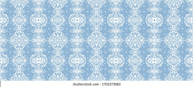 Ikat seamless pattern. Border with snowflakes. Openwork lace. New year Christmas background. Vector tie dye shibori print with stripes and chevron. Ink textured japanese background. Bohemian fashion. 