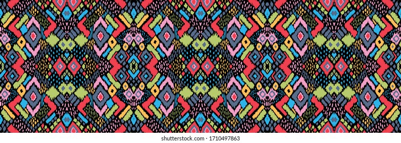 Ikat seamless pattern. Border with snowflakes. Openwork lace. New year Christmas background. Vector tie dye shibori print with stripes and chevron. Ink textured japanese background. Bohemian fashion. 