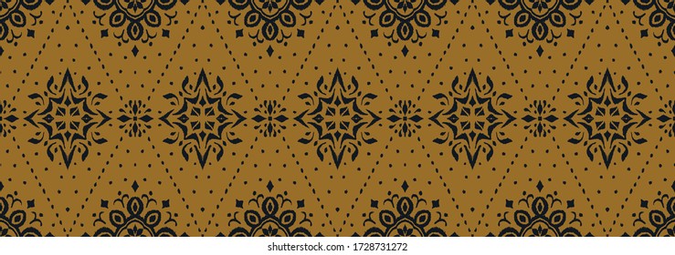 Ikat seamless pattern. Border with snowflakes. Openwork lace. New year Christmas background. Vector tie dye shibori print with stripes and chevron. Ink textured japanese background. Bohemian fashion. 