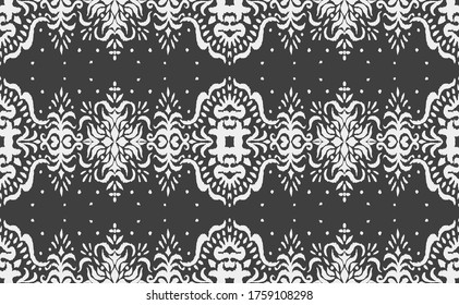Ikat seamless pattern. Border with snowflakes. Openwork lace. New year Christmas background. Vector tie dye shibori print with stripes and chevron. Ink textured japanese background. Bohemian fashion. 