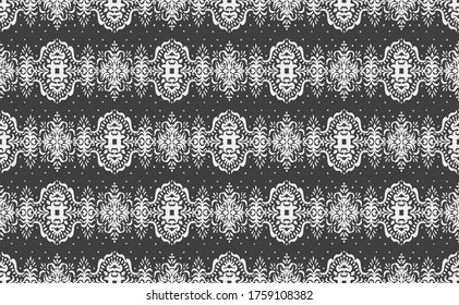 Ikat seamless pattern. Border with snowflakes. Openwork lace. New year Christmas background. Vector tie dye shibori print with stripes and chevron. Ink textured japanese background. Bohemian fashion. 