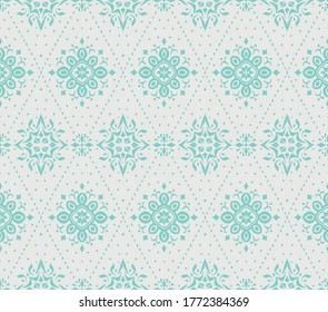 Ikat seamless pattern. Border with snowflakes. Openwork lace. New year Christmas background. Vector tie dye shibori print with stripes and chevron. Ink textured japanese background. Bohemian fashion. 