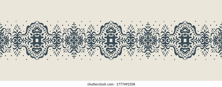 Ikat seamless pattern. Border with snowflakes. Openwork lace. New year Christmas background. Vector tie dye shibori print with stripes and chevron. Ink textured japanese background. Bohemian fashion. 