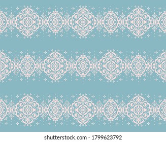 Ikat seamless pattern. Border with snowflakes. Openwork lace. New year Christmas background. Vector tie dye shibori print with stripes and chevron. Ink textured japanese background. Bohemian fashion. 
