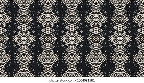 Ikat seamless pattern. Border with snowflakes. Openwork lace. New year Christmas background. Vector tie dye shibori print with stripes and chevron. Ink textured japanese background. Bohemian fashion. 