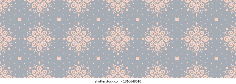 Ikat seamless pattern. Border with snowflakes. Openwork lace. New year Christmas background. Vector tie dye shibori print with stripes and chevron. Ink textured japanese background. Bohemian fashion. 
