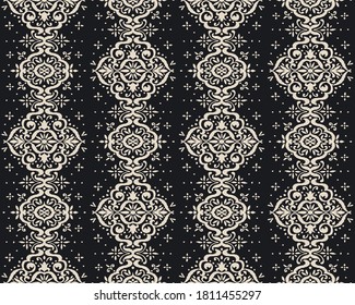 Ikat seamless pattern. Border with snowflakes. Openwork lace. New year Christmas background. Vector tie dye shibori print with stripes and chevron. Ink textured japanese background. Bohemian fashion. 