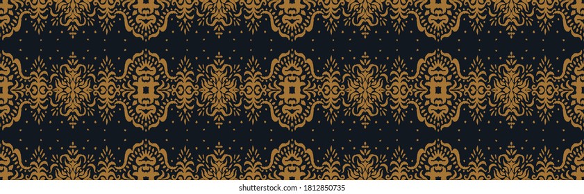Ikat seamless pattern. Border with snowflakes. Openwork lace. New year Christmas background. Vector tie dye shibori print with stripes and chevron. Ink textured japanese background. Bohemian fashion. 
