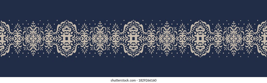 Ikat seamless pattern. Border with snowflakes. Openwork lace. New year Christmas background. Vector tie dye shibori print with stripes and chevron. Ink textured japanese background. Bohemian fashion. 