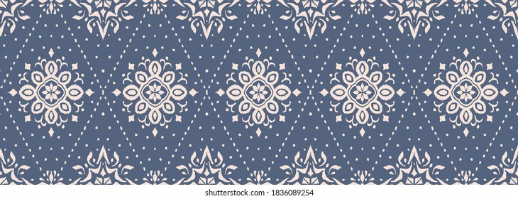 Ikat seamless pattern. Border with snowflakes. Openwork lace. New year Christmas background. Vector tie dye shibori print with stripes and chevron. Ink textured japanese background. Bohemian fashion. 