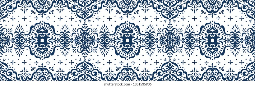 Ikat seamless pattern. Border with snowflakes. Openwork lace. New year Christmas background. Vector tie dye shibori print with stripes and chevron. Ink textured japanese background. Bohemian fashion. 