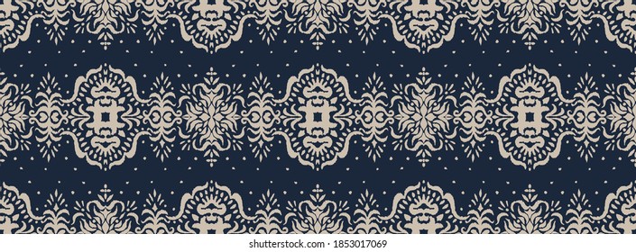 Ikat seamless pattern. Border with snowflakes. Openwork lace. New year Christmas background. Vector tie dye shibori print with stripes and chevron. Ink textured japanese background. Bohemian fashion. 