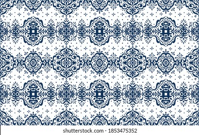 Ikat seamless pattern. Border with snowflakes. Openwork lace. New year Christmas background. Vector tie dye shibori print with stripes and chevron. Ink textured japanese background. Bohemian fashion. 