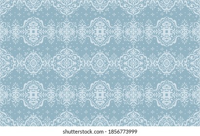 Ikat seamless pattern. Border with snowflakes. Openwork lace. New year Christmas background. Vector tie dye shibori print with stripes and chevron. Ink textured japanese background. Bohemian fashion. 