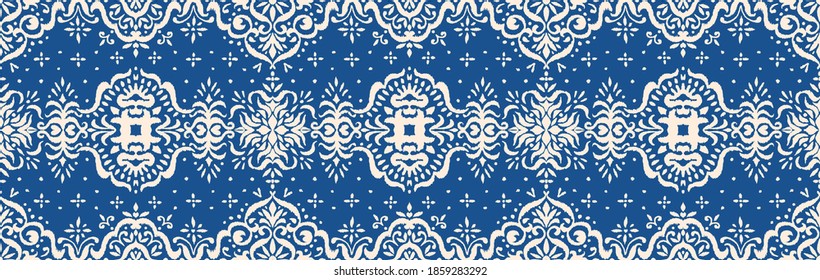 Ikat seamless pattern. Border with snowflakes. Openwork lace. New year Christmas background. Vector tie dye shibori print with stripes and chevron. Ink textured japanese background. Bohemian fashion. 
