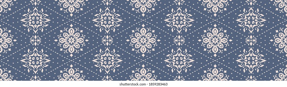 Ikat seamless pattern. Border with snowflakes. Openwork lace. New year Christmas background. Vector tie dye shibori print with stripes and chevron. Ink textured japanese background. Bohemian fashion. 