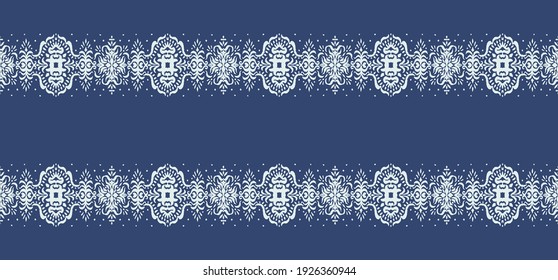 Ikat seamless pattern. Border with snowflakes. Openwork lace. New year Christmas background. Vector tie dye shibori print with stripes and chevron. Ink textured japanese background. Bohemian fashion. 