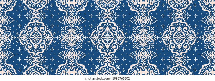 Ikat seamless pattern. Border with snowflakes. Openwork lace. New year Christmas background. Vector tie dye shibori print with stripes and chevron. Ink textured japanese background. Bohemian fashion. 