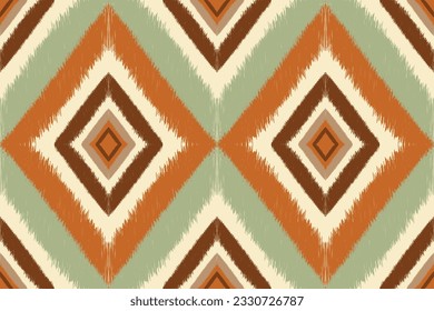 Ikat seamless pattern. Ikat chevron geometric ethnic pattern traditional background.Brown green earth tone.Aztec style,embroidery,abstract, vector,illustration. design for texture, fabric, clothing.
