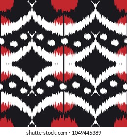 Ikat seamless pattern  as cloth, curtain, textile design, wallpaper, surface texture background.