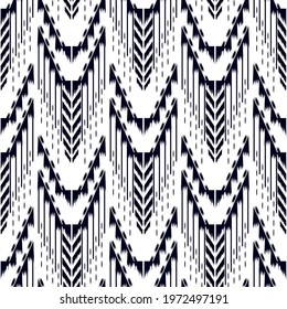 Ikat seamless pattern as cloth, curtain, textile design, wallpaper, surface texture background. Vector EPS10