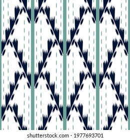 Ikat seamless pattern as cloth, curtain, textile design, wallpaper, surface texture background. Vector EPS10