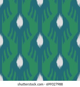 Ikat seamless pattern  as cloth, curtain, textile design, wallpaper, surface texture background.