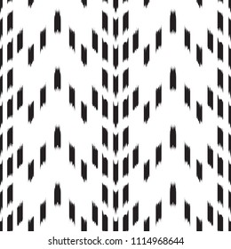 Ikat Seamless Pattern Design. Ethnic fabric. Bohemian fashion.
