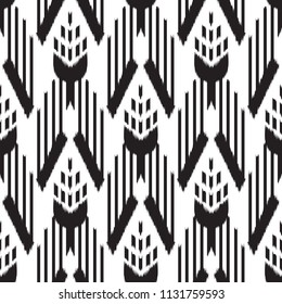 Ikat Seamless Pattern Design. Ethnic fabric. Bohemian fashion.