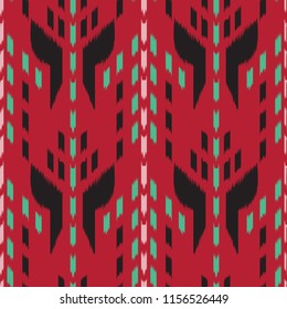 Ikat Seamless Pattern Design. Ethnic fabric. Bohemian fashion.