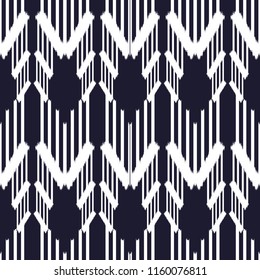 Ikat Seamless Pattern Design. Ethnic fabric. Bohemian fashion.