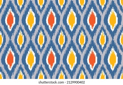 Ikat seamless pattern design for fabric vector image. Surface design for print, fabric, wallpaper, gift wrap, texture. Tribal vector illustration