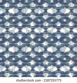 Ikat Seamless Pattern Design for Fabric.Seamless geometric pattern, based on ikat blue fabric style. Vector illustration.Geometry texture trendy modern repeat pattern