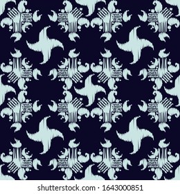Ikat. Seamless pattern. Geometric background. Vector illustration for web design or print.