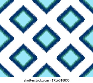 Ikat seamless pattern for home decor ideas. Ethnic, Indian, Aztec, fabric, boho, geometric chevron wallpaper. Pillow textile decoration. African, American fashion design. Geometric vector illustration