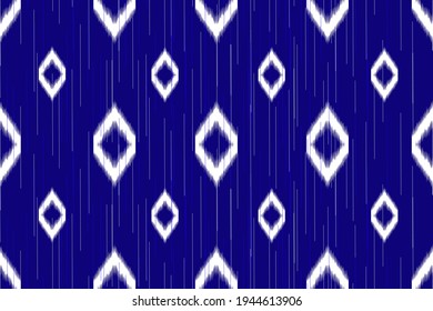 Ikat es un modelo perfecto para la decoración en casa. Papel tapiz de chevron de alfombra de boho, de etnia africana, india. Papel tapizado para la decoración de tejidos de almohada. Fondo geométrico, gráfico vectorial.