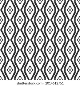 Ikat seamless pattern for home decor ideas, textile, wallpaper, card or wrapping paper. Ethnic, boho fashion style. Tribal vector background. Black and white graphic design.