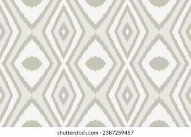Ikat Seamless pattern paisley embroidery on white background.Ikat ethnic oriental seamless pattern traditional.Aztec style abstract vector illustration.design for texture,fabric,clothing,saree,sari