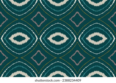 Ikat Seamless pattern paisley embroidery background. Ikat ethnic oriental seamless pattern traditional.Aztec style abstract vector illustration.design for texture,fabric,clothing,saree,sari