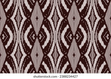 Ikat Seamless pattern paisley embroidery background. Ikat ethnic oriental seamless pattern traditional.Aztec style abstract vector illustration.design for texture,fabric,clothing,saree,sari