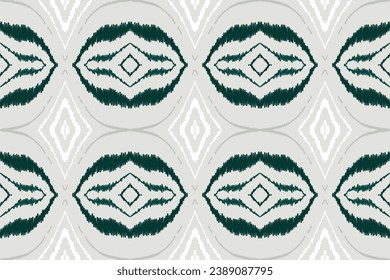 Ikat Seamless pattern paisley embroidery Tribal background. Ikkat ethnic oriental seamless pattern traditional.Aztec style abstract vector illustration.design for texture,fabric,clothing,saree,sari